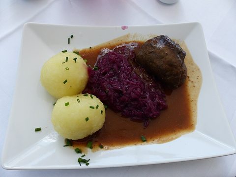 Representative photograph of Beef Rouladen. The photograph includes dumplings and red cabbage not included in this draft.