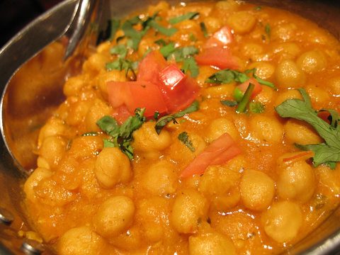 Chickpeas in an orange tomato gravy with fresh coriander