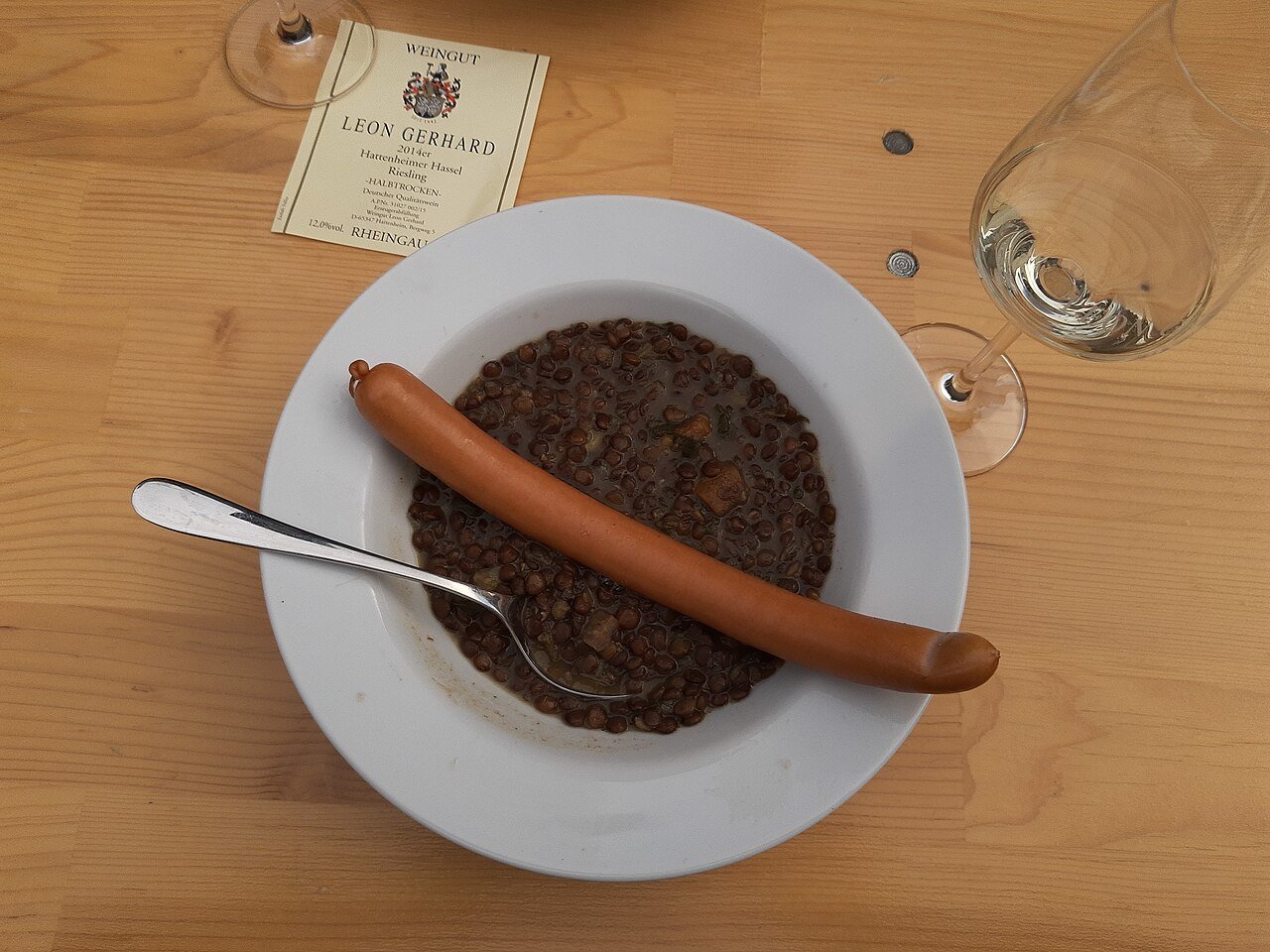 Representative photograph of German Lentil Soup. The photograph includes a sausage; this draft makes vegetarian lentil soup without sausage.