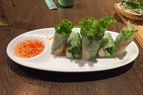Representative photograph of Goi Cuon. The photograph shows a chili dipping sauce; this draft uses peanut-hoisin sauce.