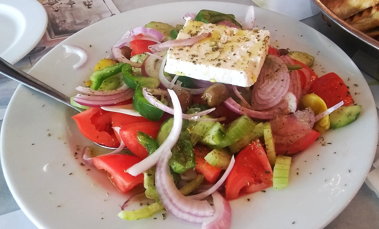 Greek salad with tomato, cucumber, red onion, green pepper and feta