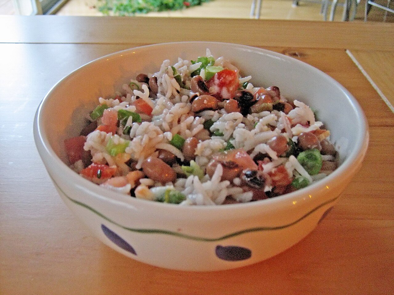 Representative photograph of Hoppin John. The photograph includes tomato pieces not included in this draft.