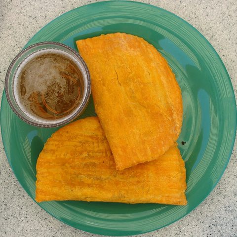 Representative photograph of Jamaican Beef Patties. The source identifies Jamaican patties but does not identify the filling. This draft uses beef.