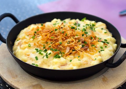 Representative photograph of Kasespatzle. The photograph includes chive garnish not included in this draft.