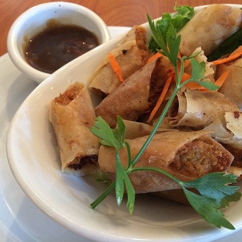 Representative photograph of Lumpiang Shanghai. The photograph includes dipping sauce and garnish not included in this draft.