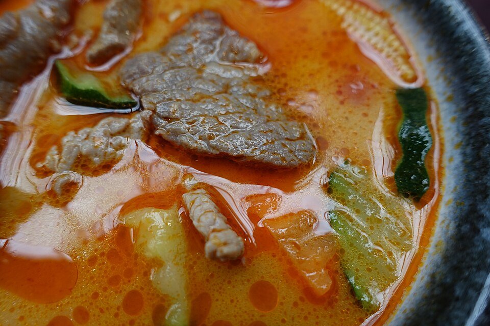 Representative photograph of Massaman Beef Curry. The photo shows a restaurant serving; the cut of beef differs.