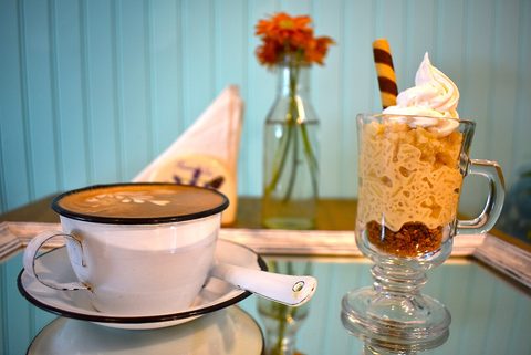 Representative photograph of Mexican Arroz con Leche. The photograph includes sweet toppings and a cup of coffee not included in this rice pudding recipe.