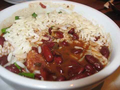 Representative photograph of Red Beans and Rice. Rice is served beside the beans.