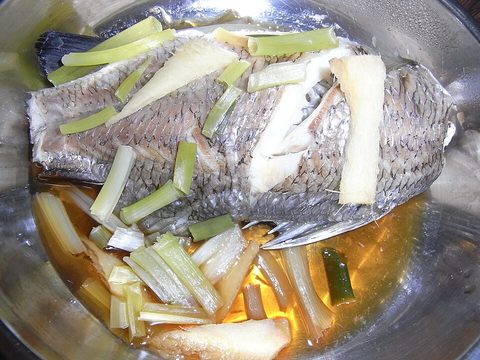 Representative photograph of Steamed Fish with Ginger. The photograph shows a larger fish portion; this recipe uses fillets.