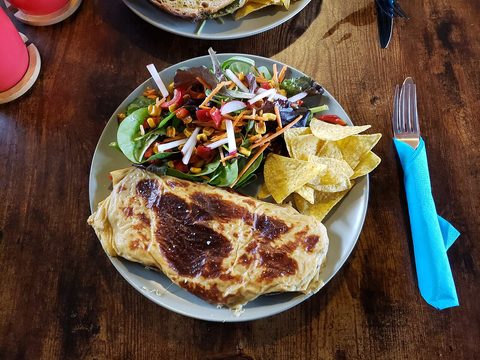 Representative photograph of Welsh Rarebit. The photograph includes salad and crisps not included in this draft.